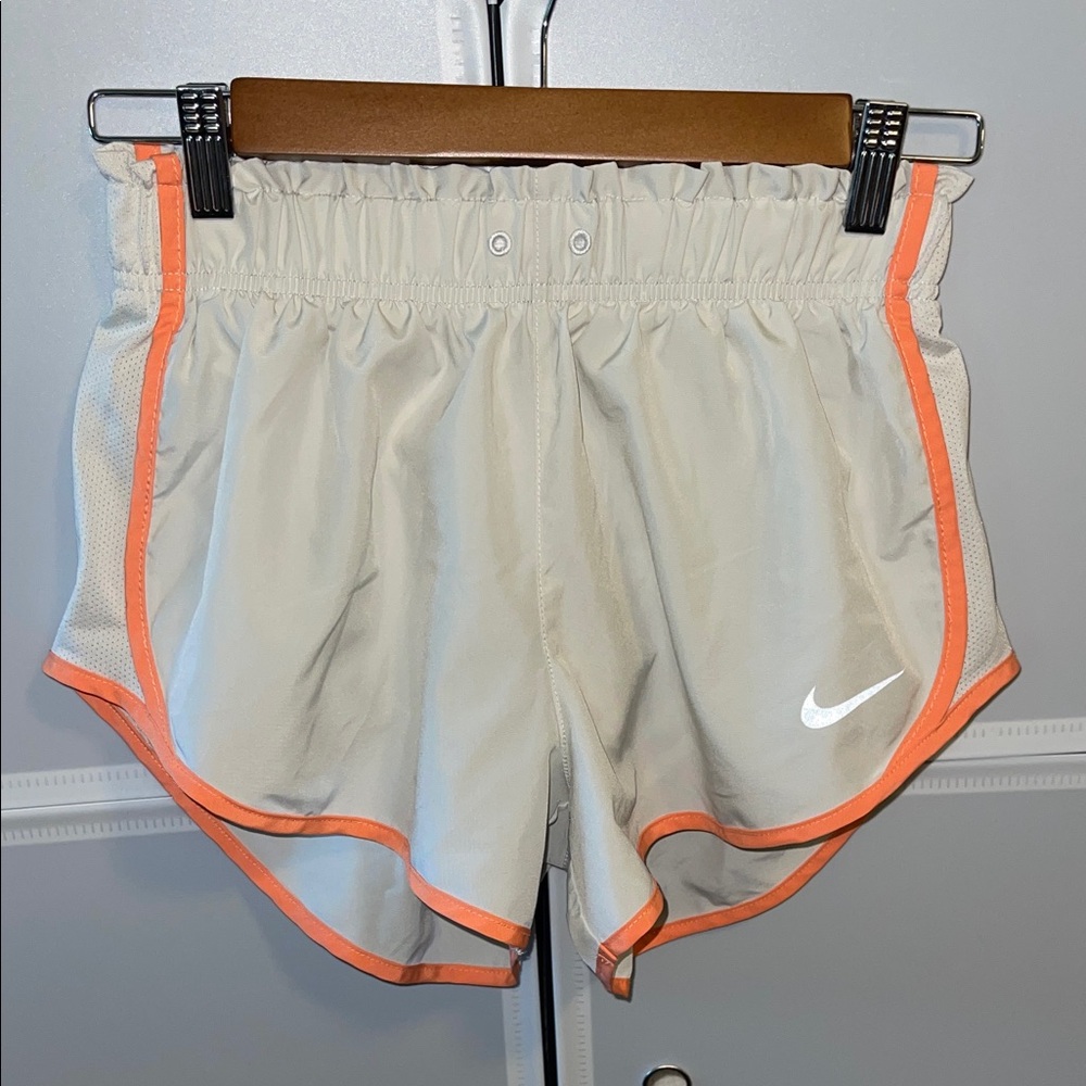 Nike Women's Athletic Shorts in cream with Orange Trim